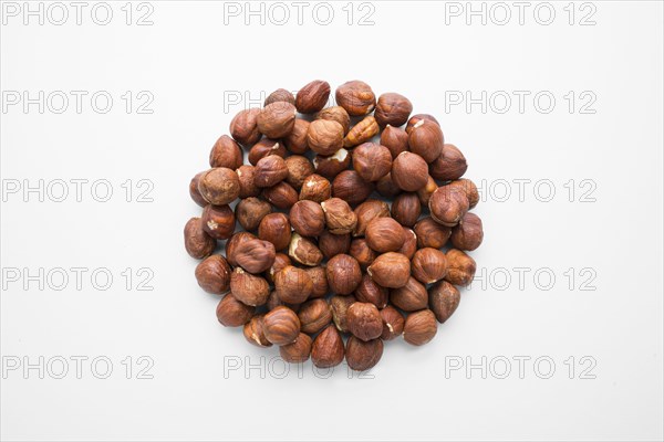 Pile of hazelnuts in shape of a circle