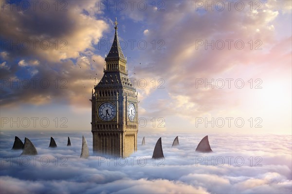 Shark fins and birds circling clock tower above clouds