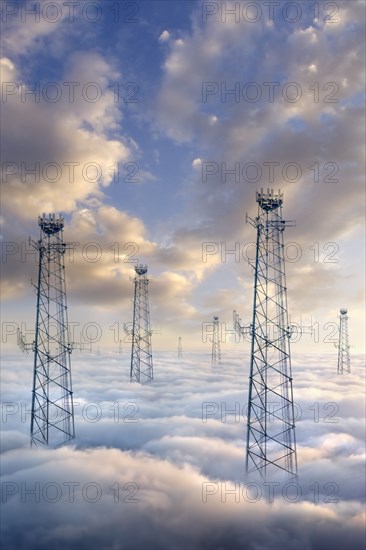 Cellular towers above clouds