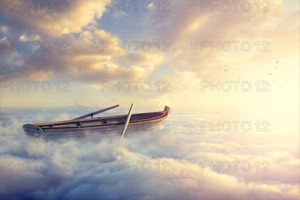 Empty rowboat above clouds