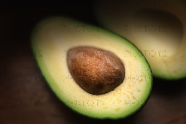Pit in sliced avocado