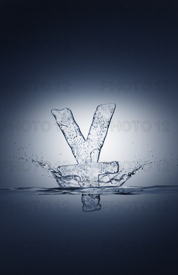 Water droplets splashing from sinking ice yuan symbol