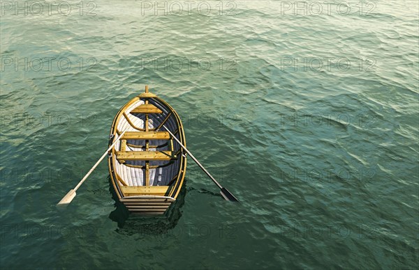 Abandoned rowboat in ocean