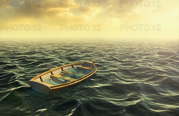 Abandoned sinking rowboat in ocean