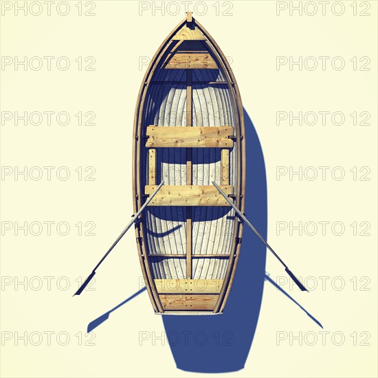 High angle view of rowboat and oars floating in white background