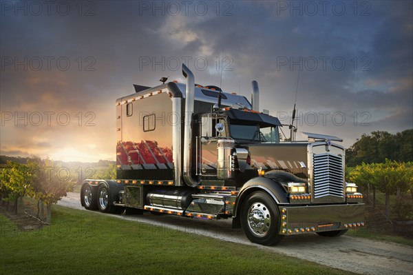 Semi-truck driving on rural road