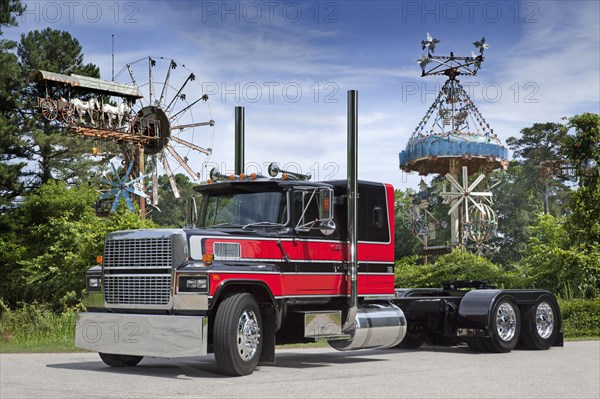 Semi-truck near amusement park