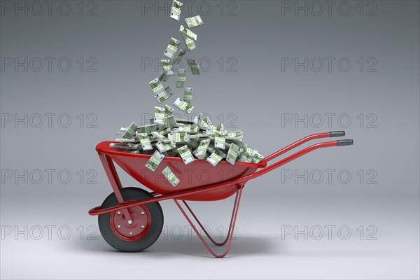 Euros falling into red wheelbarrow