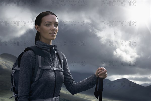 Caucasian woman hiking in mountains