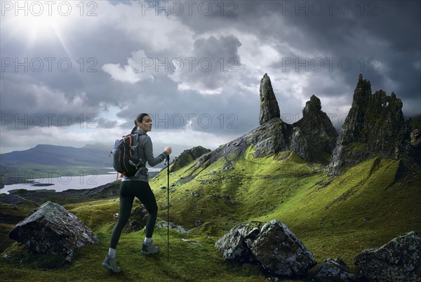 Caucasian woman hiking in rocky landscape