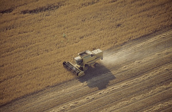 Tractor harvesting crops