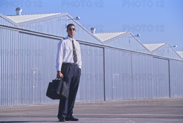 Pilot on tarmac portrait