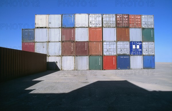 Row of shipping containers in port