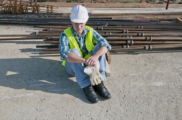 worker taking break in construction site