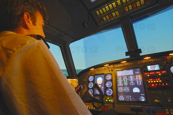 Pilots in aircraft cockpit