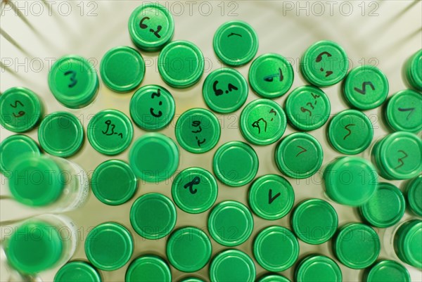 Green lids on test tubes
