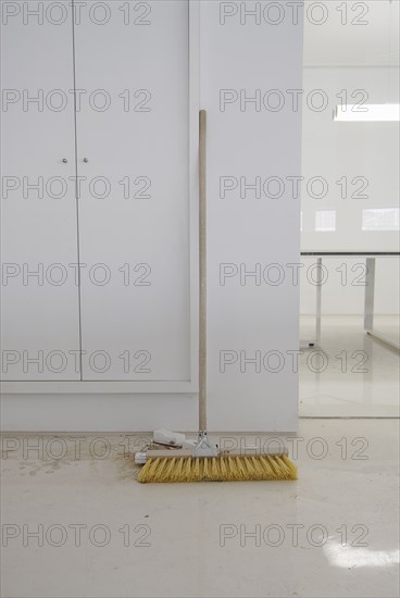 Broom in office