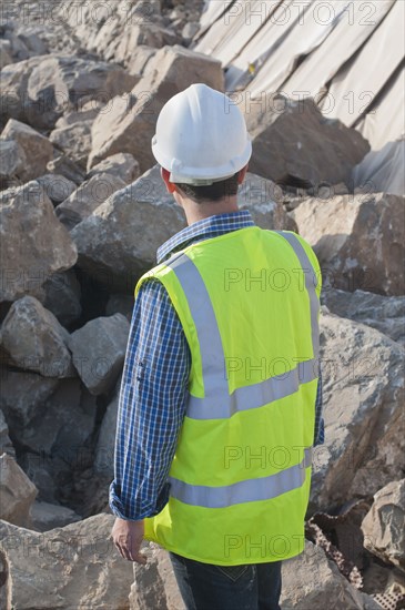 rear view of engineer in construction site