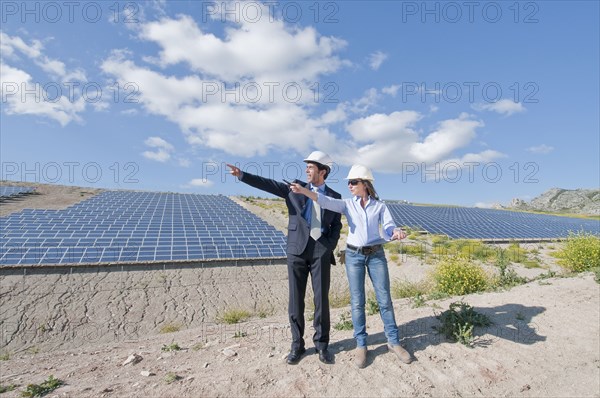 engineer and businessman in solar plant