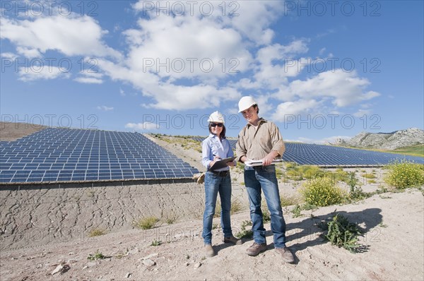 male and female engineer in solar plant