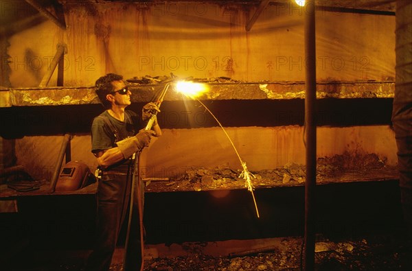 Man welding in workshop