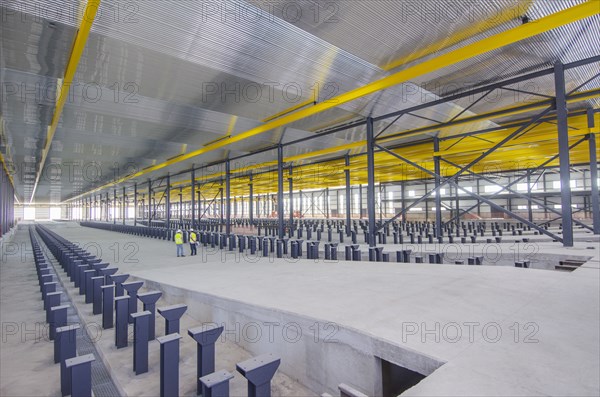 Workers standing in warehouse