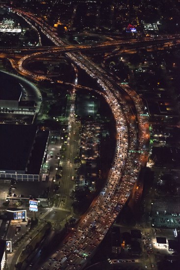 Aerial view of highway in Los Angeles cityscape