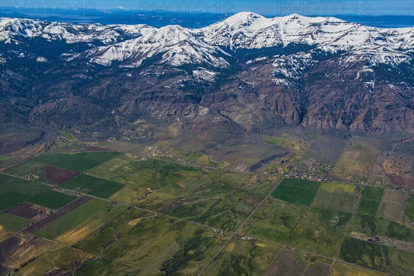 Aerial view of farmland and mountains