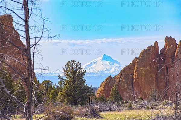 Mountain behind rock formations