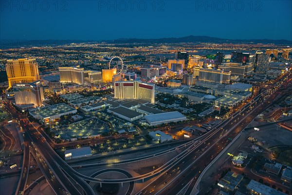 Aerial view of illuminated cityscape