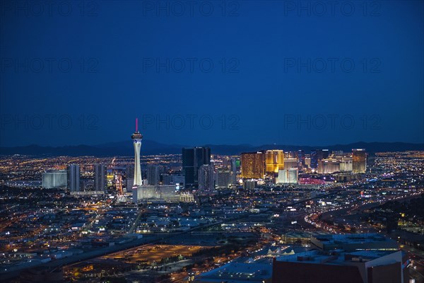 Aerial view of illuminated cityscape