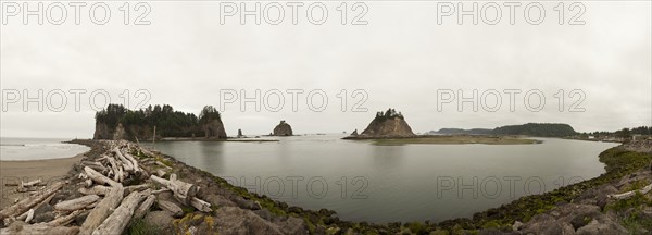 Panoramic view of sea stacks on beach