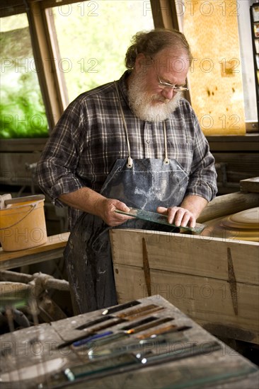 Caucasian craftsman in workshop