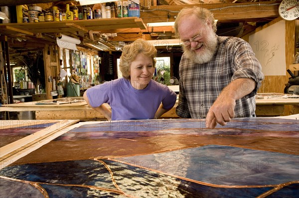 Caucasian craftspeople in workshop