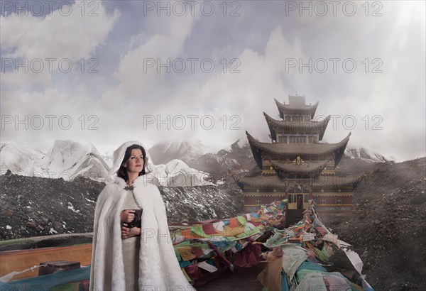 Caucasian woman standing near monument