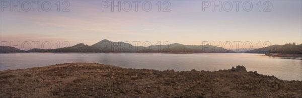 Panoramic view of lake in remote landscape