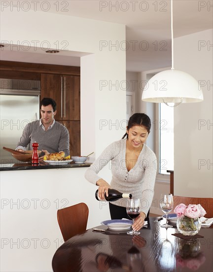 Couple preparing dinner together