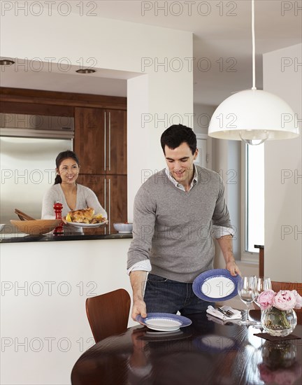 Couple preparing dinner together