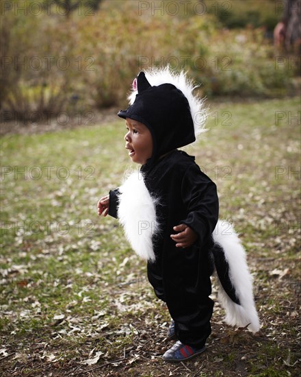 African American baby in skunk costume