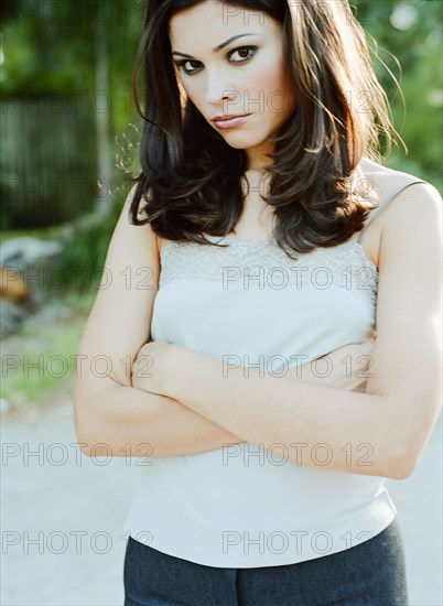 Woman standing with arms crossed