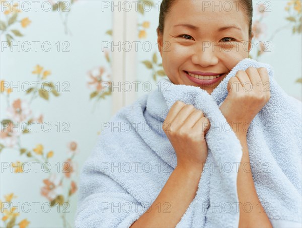 Woman wrapped in towel