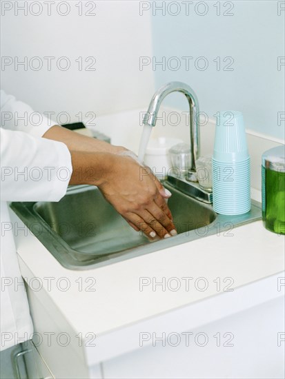 Woman washing hands