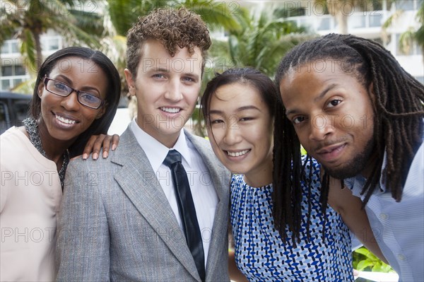 Business people smiling outdoors