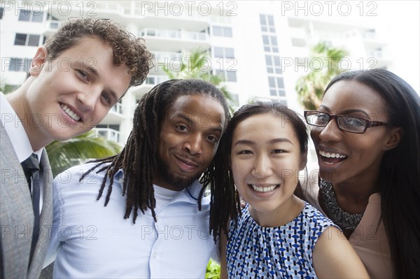 Business people smiling outdoors