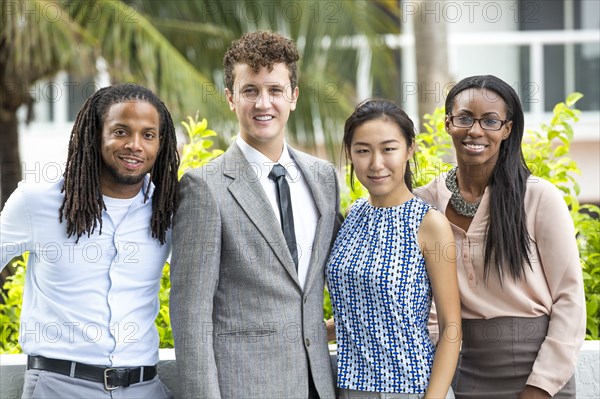 Business people smiling outdoors