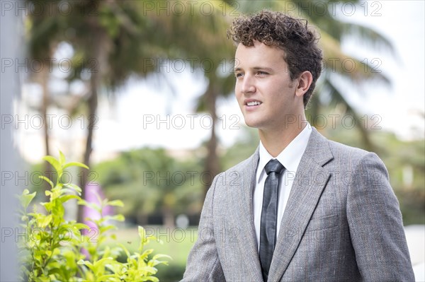 Caucasian businessman standing outdoors