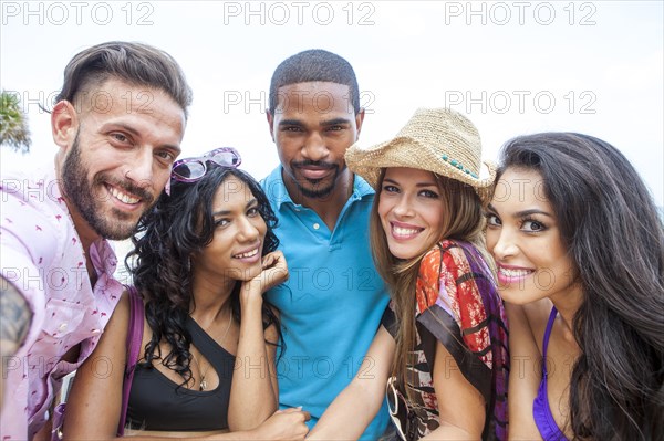 Portrait of friends smiling outdoors