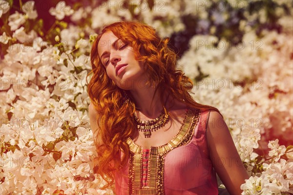 Caucasian woman in flowering tree