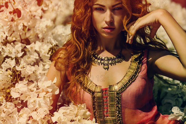 Caucasian woman in flowering tree