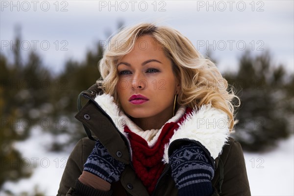 Caucasian woman wearing coat outdoors in winter